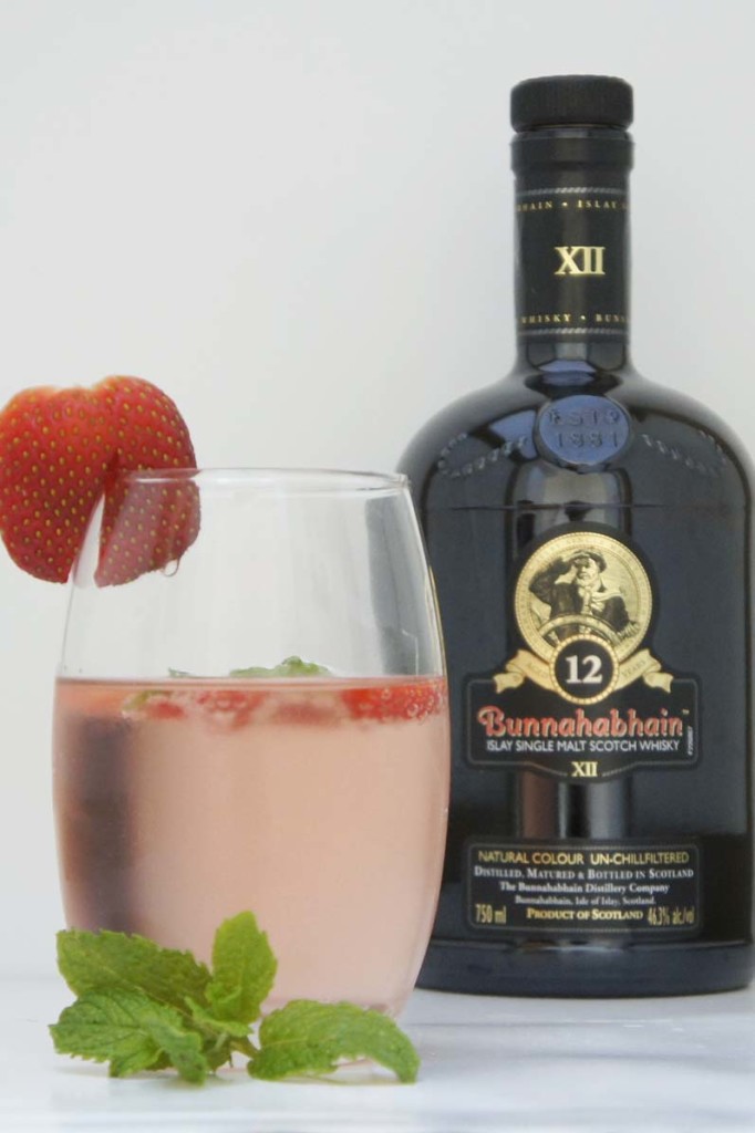 pink valentine's day whisky cocktails. Strawberry oasis cocktail with Bunnahabhain 12 yo single malt whisky