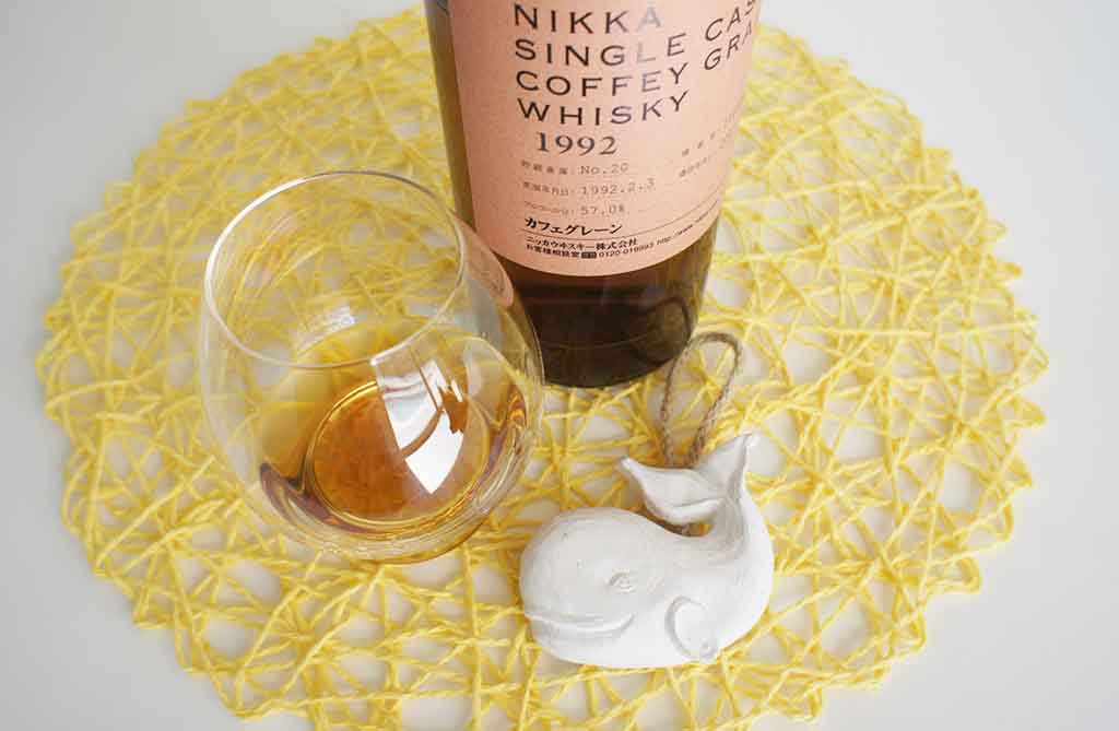 Review and tastingnotes Nikka Single Cask Coffey Grain 1992 whisky with glass