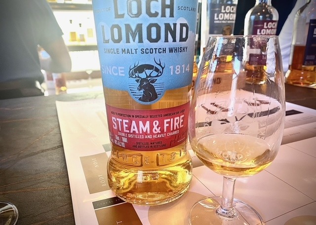 Loch Lomond Fire and Steam whisky with glass