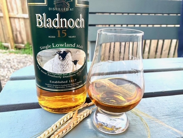 bladnoch 15 year old whisky with glass