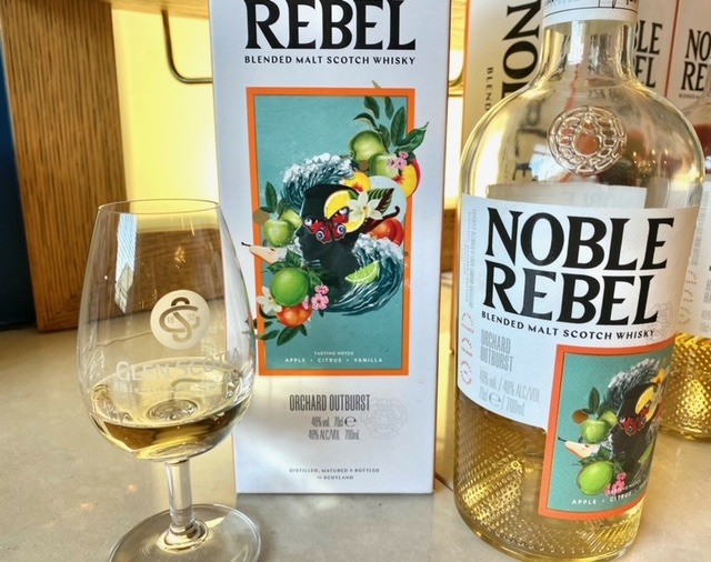 noble rebel orchard outburst whisky with glass