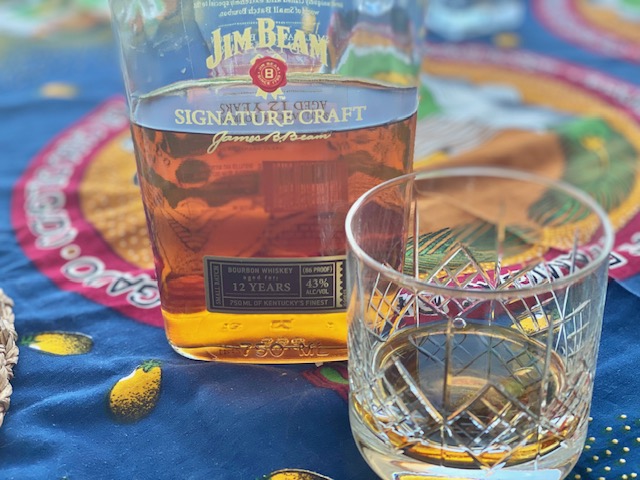 Jim Beam Signature Craft 12 year old Bourbon with a glass review and tasting notes