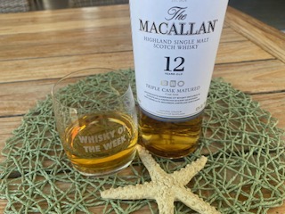 Macallan 12 year old triple cask whisky with glass