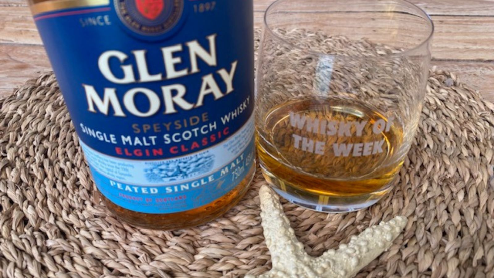 Glen Moray Peated whisky with glass