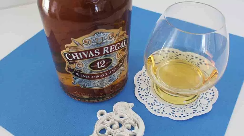 Chivas Regal 12 yo blended whisky with glass