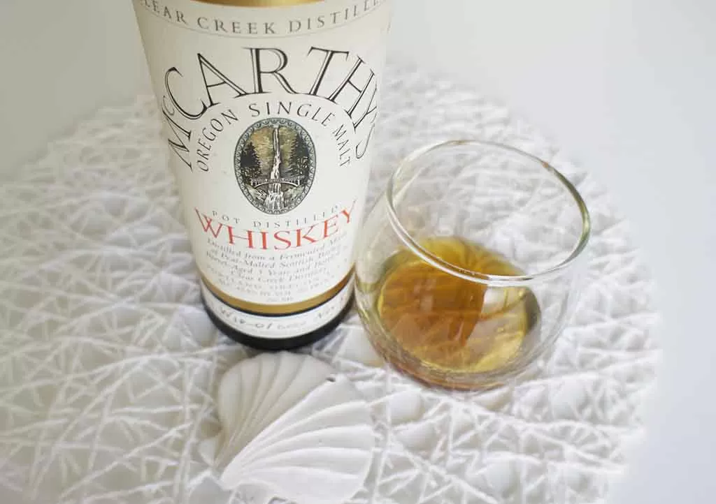 McCarthy's Oregon whiskey with glass