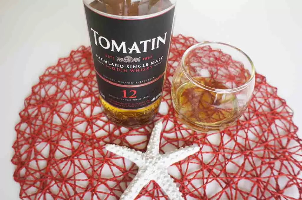 Review and tasting notes for the Tomatin 12 yo single malt whisky with glass