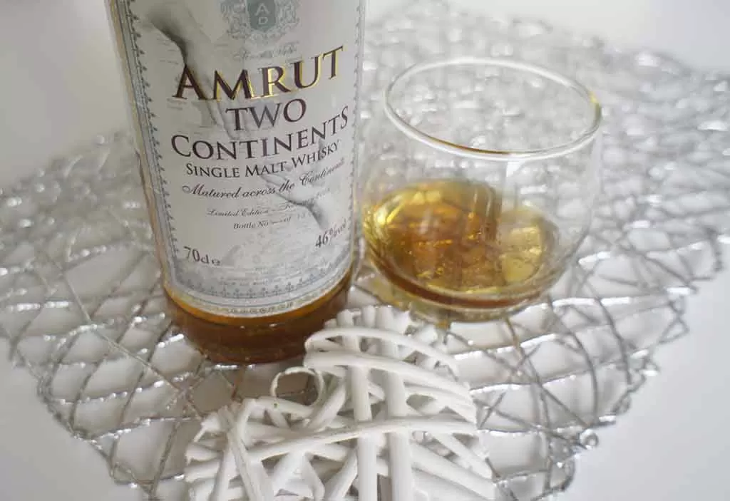 Review and tasting notes Amrut Two Continents whisky from India with glass