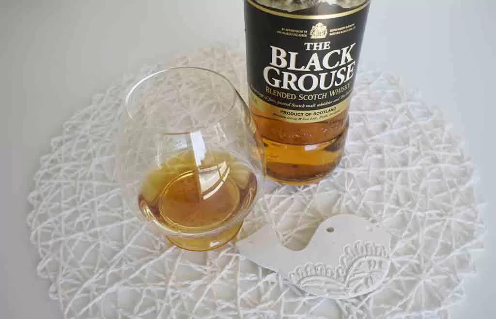 The Black Grouse Blended Whisky with glass b