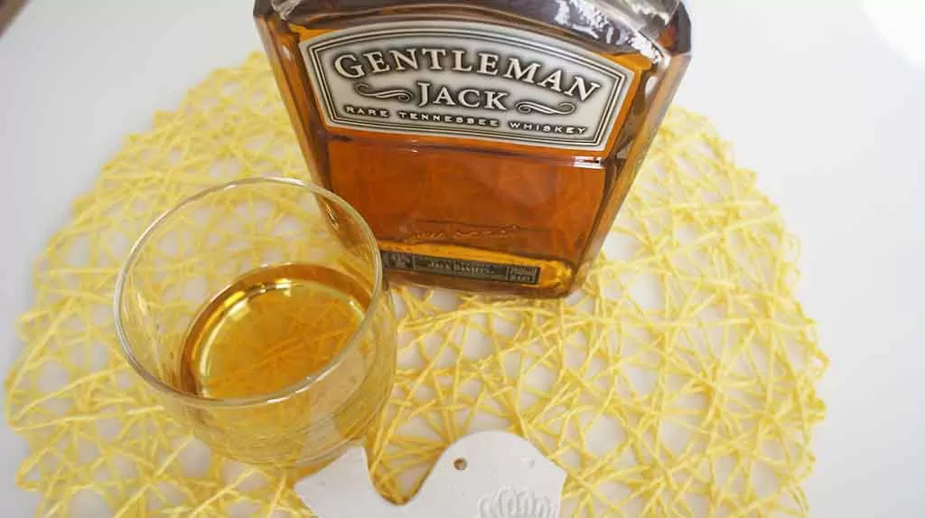 Jack Daniels Gentleman Jack whiskey with glass