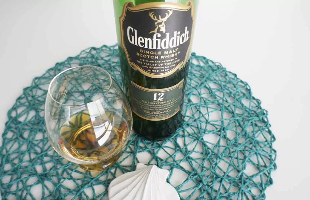 The Glenfiddich 12 yo with glass b