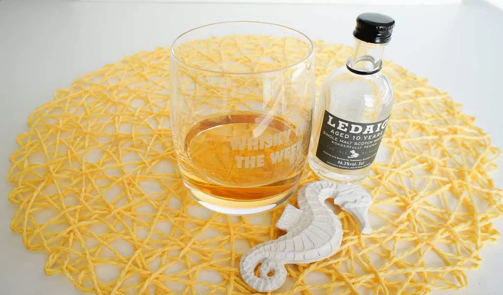 Ledaig 10 yo Single Malt Whisky with glass