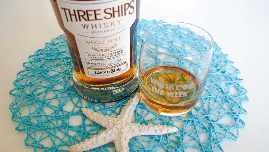 Three Ships virgin oak whisky with glass