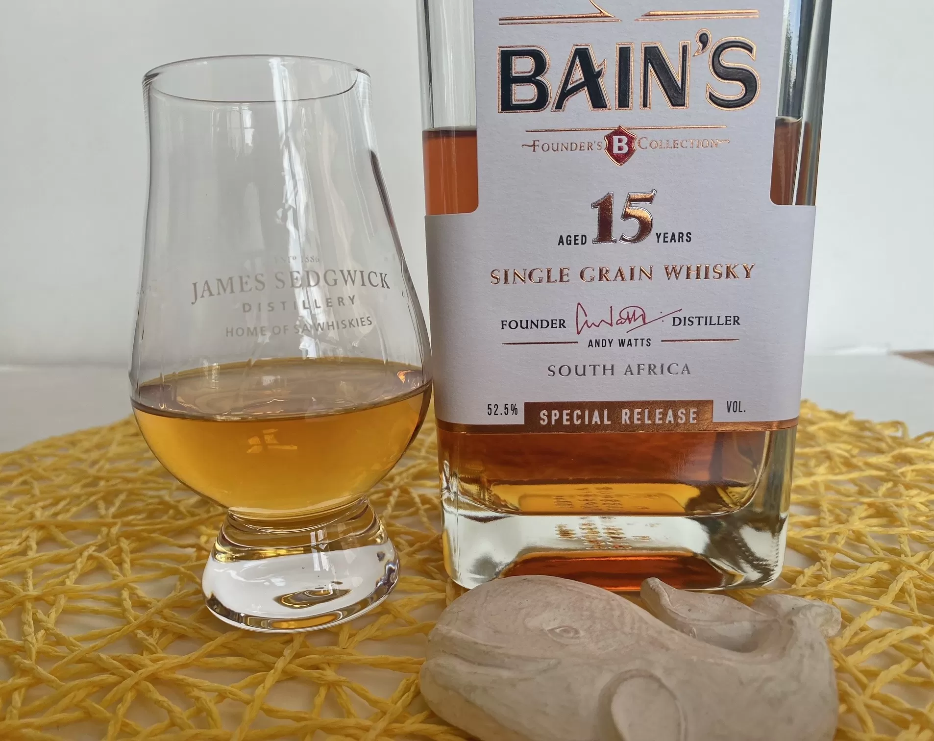 Bains 15 yo whisky with glass