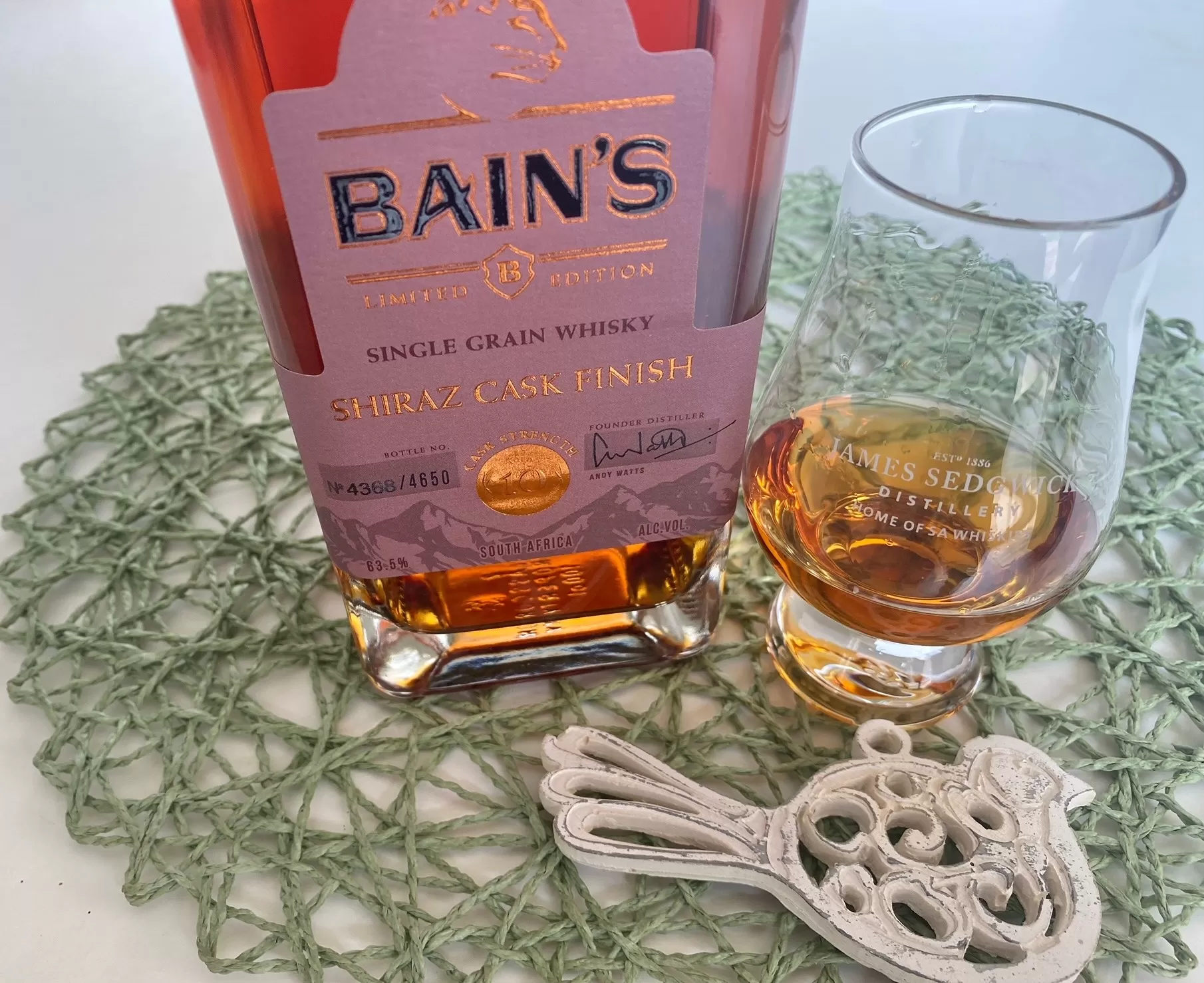 Bains Shiraz Cask whisky with glass