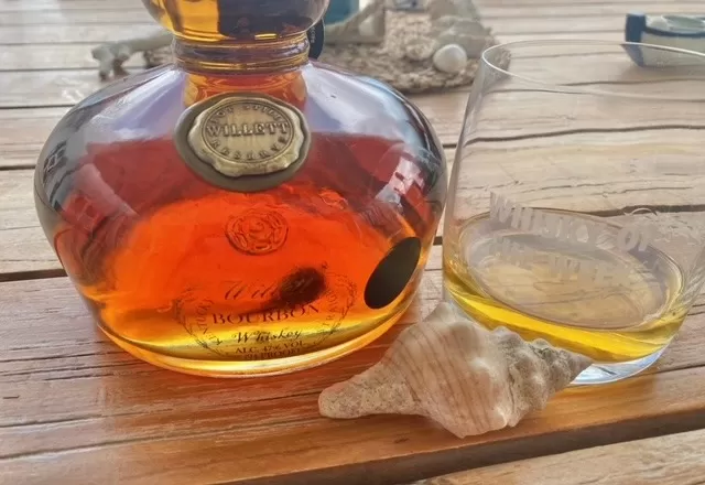 Willet pot still reserve bourbon with glass