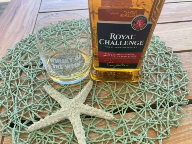 Royal Challenge whisky with glass
