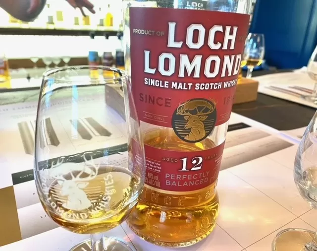 loch lomond 12 year old whisky with glass