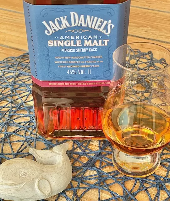 Jack Daniel's single malt whiskey with glass